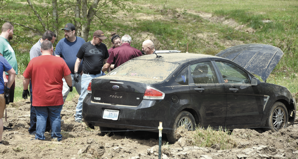 Man crashes into Middlefork garden