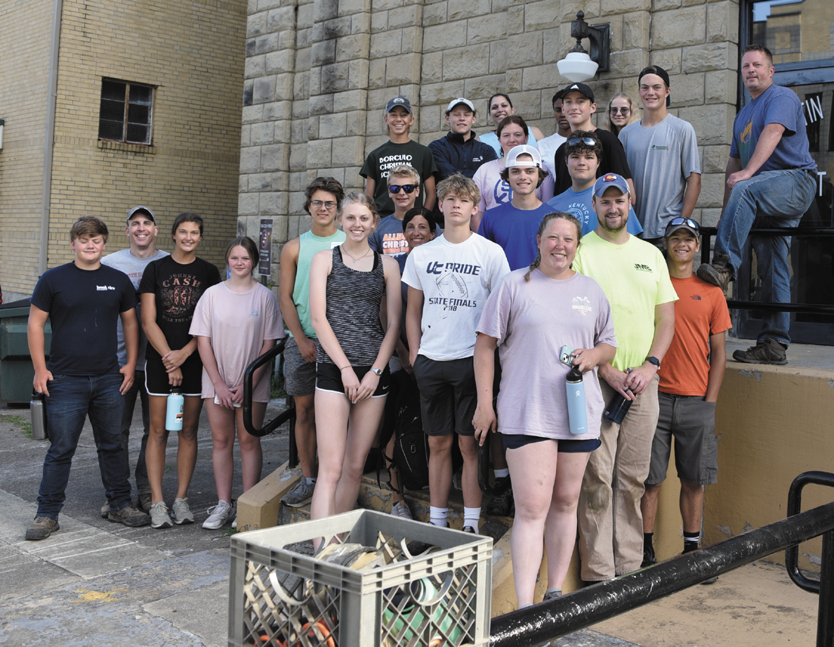 Out-of-state volunteers roll up sleeves in Martin County