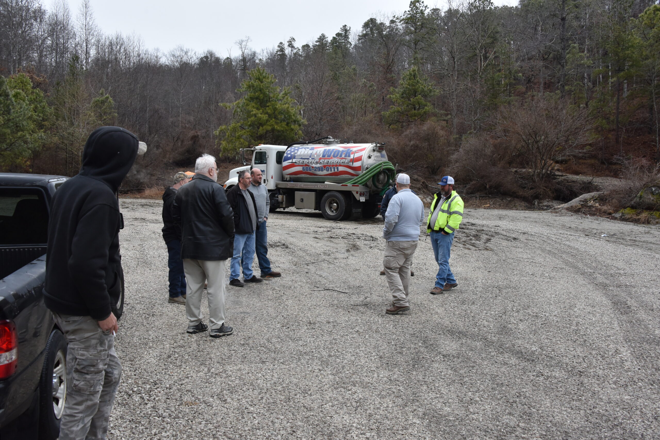 Former industrial waste pit used as sewer disposal site