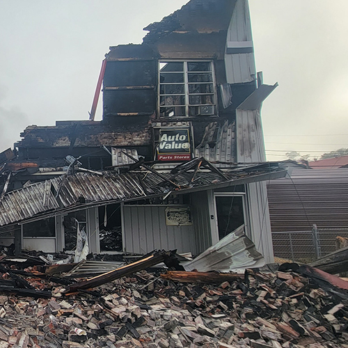 Building damaged by fire collapses in Williamson; two firefighters injured