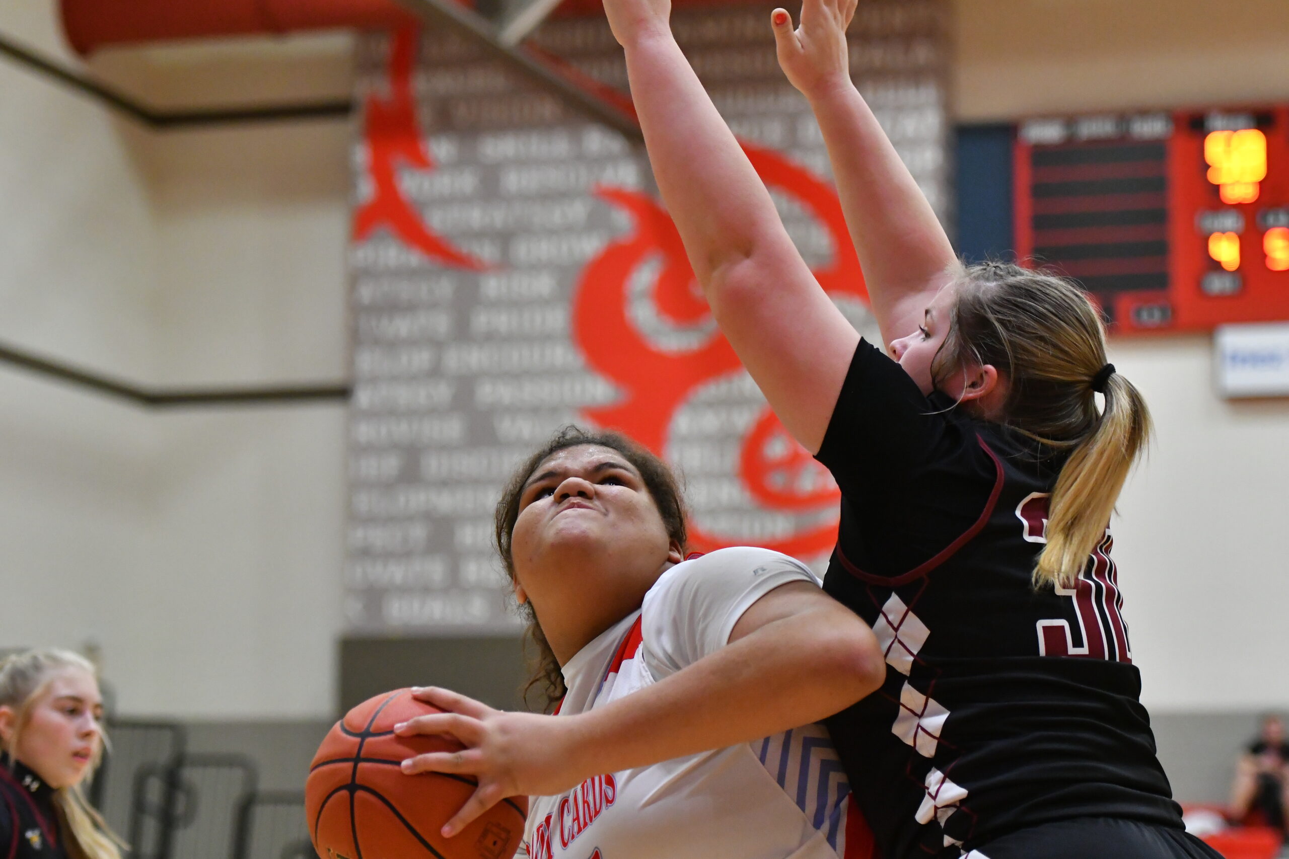 Lady Cards swat Hornets, cage Tigers in district matchups