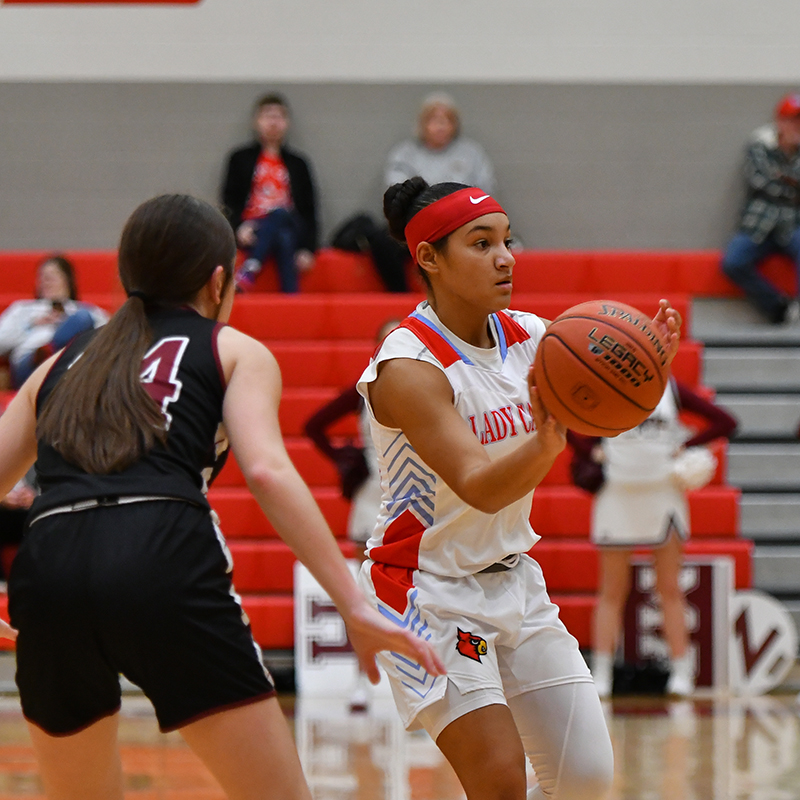 Lady Cards take sting out of Hornets