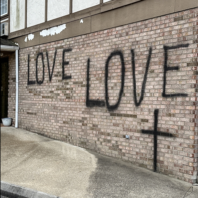 Man arrested for spray-painting Inez motel ‘in the name of love’