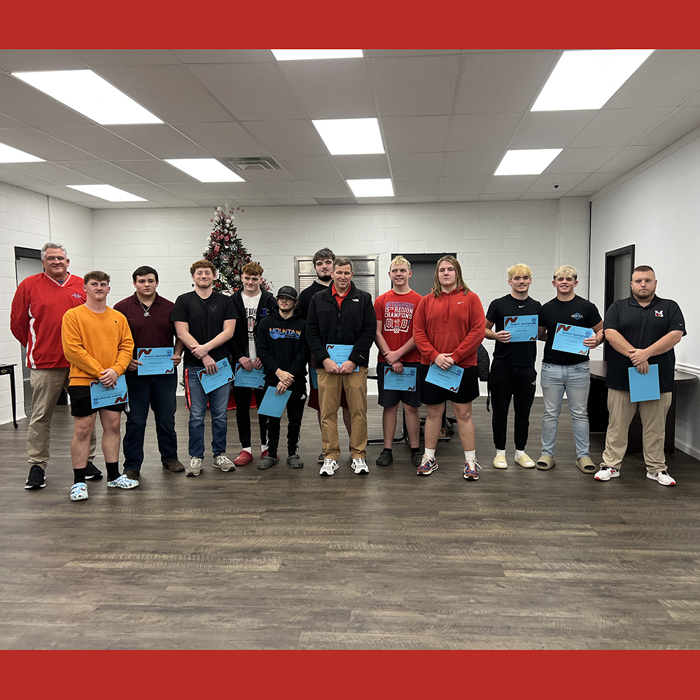 School board honors Cardinals football team