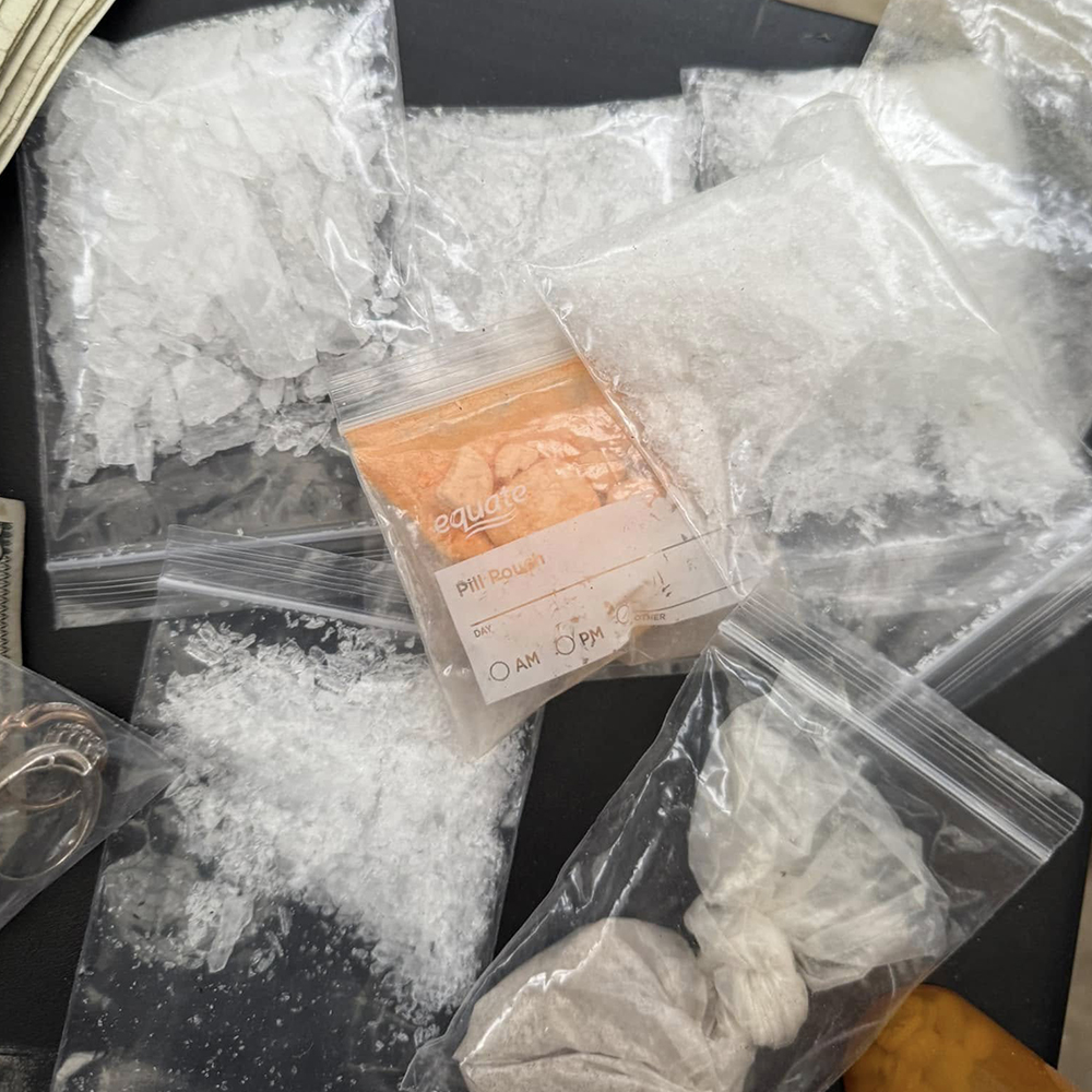 Christmas Eve drug bust yields meth, heroin and firearms