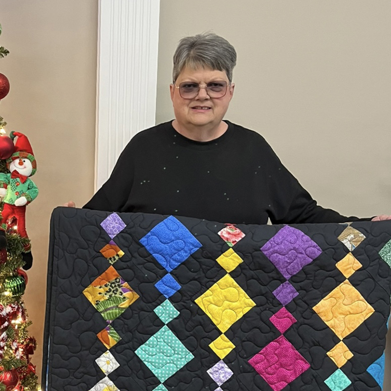 Music wins handcrafted quilt in fundraiser