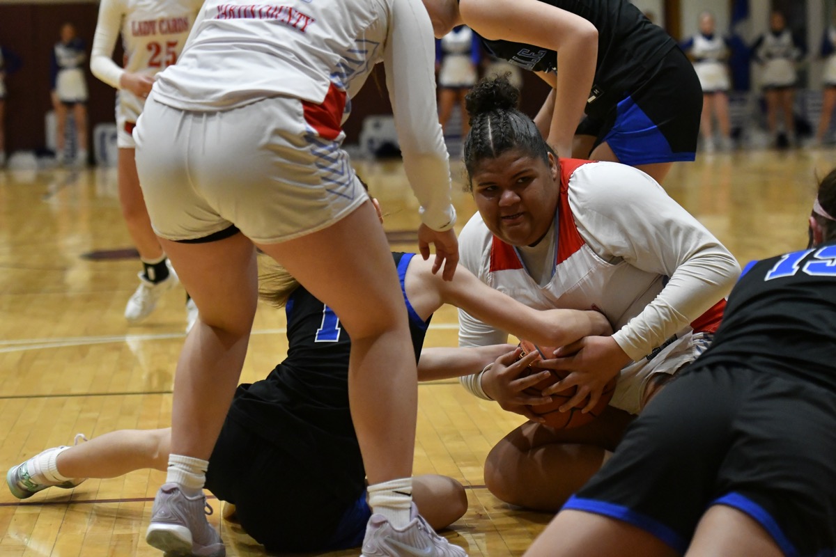 Lady Cards fall to Tigers in OT