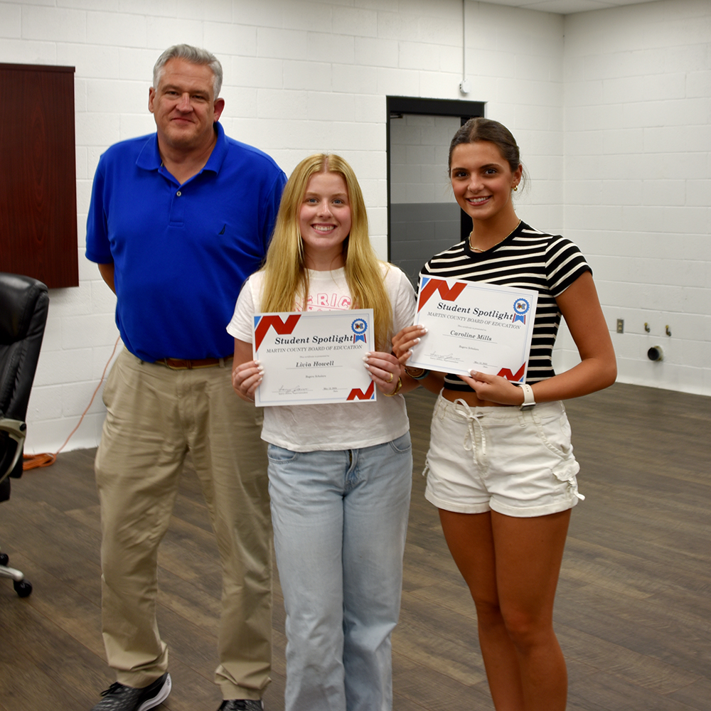 School board honors scholars, champs, standout staff