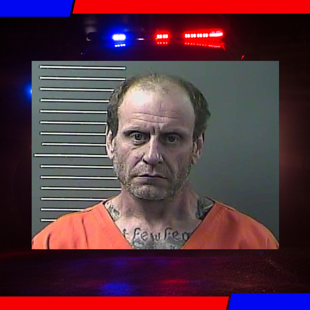 Treed by ‘coons, man nabbed after wreck