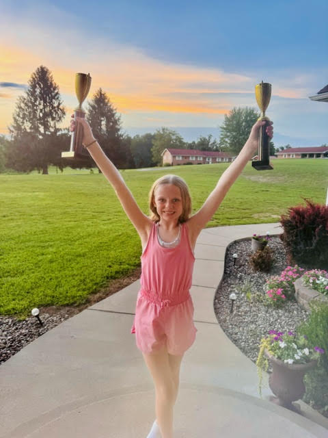 Williams serves with 14U tennis crown