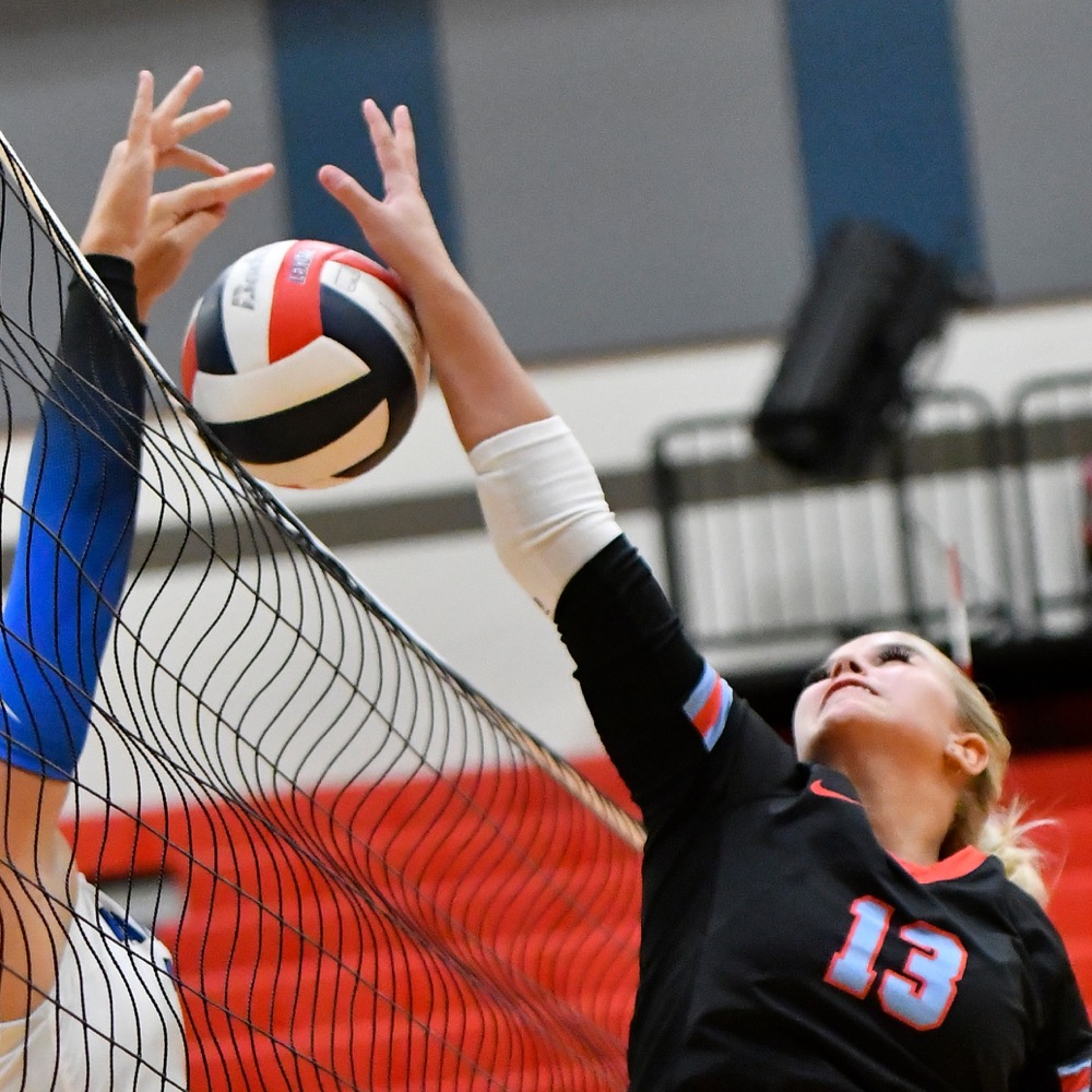 Lady Cardinals open volleyball season with win