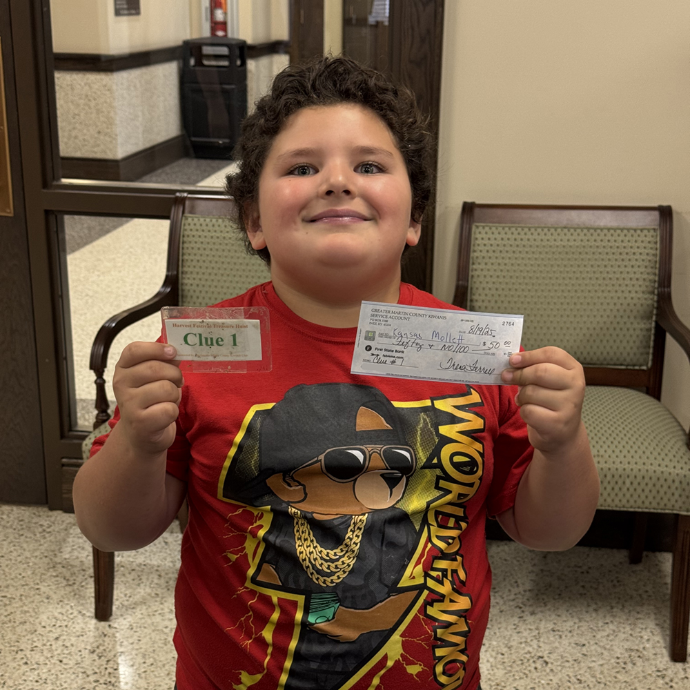 Wynne finds Harvest Fest Treasure Hunt clue 1