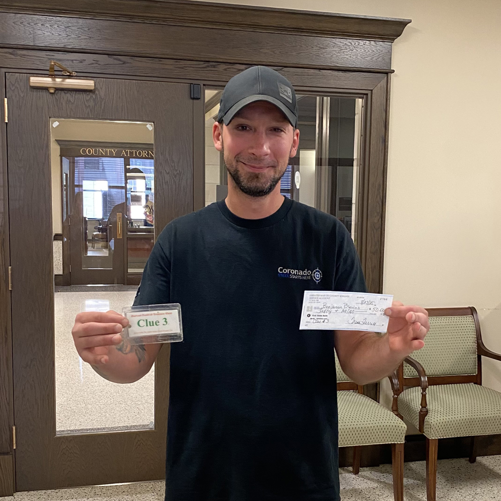 Blevins finds Harvest Fest Treasure Hunt Clue #3