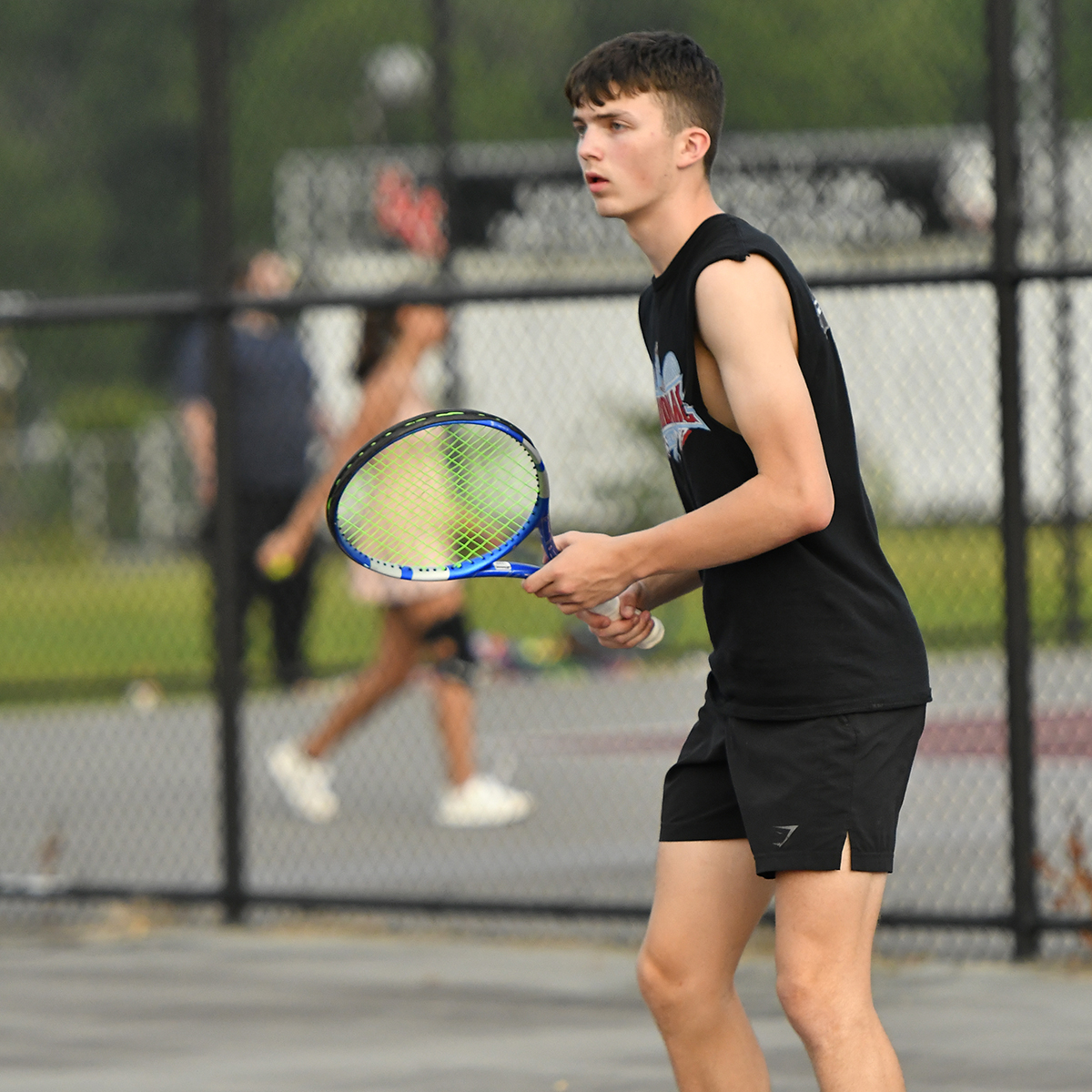 Cardinals tennis teams split matches